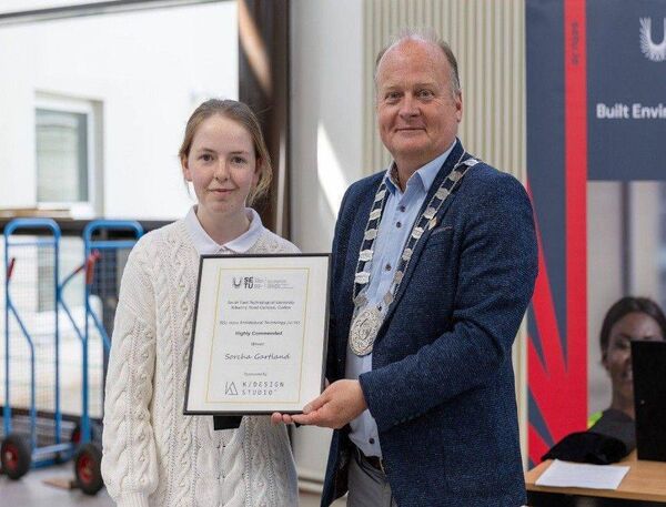 Sorcha Gartland being presented with the Highly Commended award by cllr Fergal Browne
