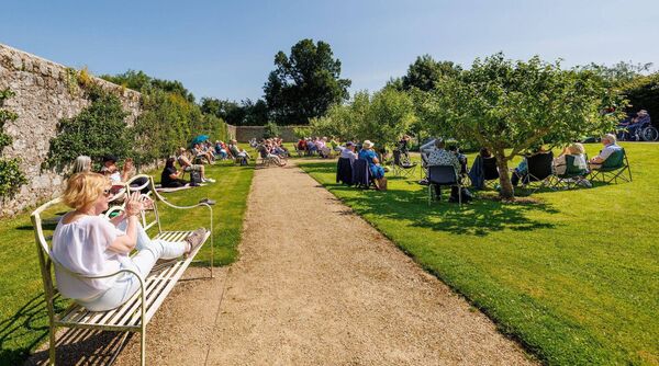 Enjoying the music and sunshine at the mid-summer trad session in Altamont Gardens