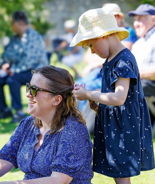 Lucy Rothwell helps her mother Avril fix her hair