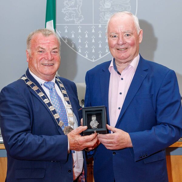 Cllr Ken Murnane (Cathaoirleach Carlow County Council) makes a presentation to Cllr John Pender to mark his 40 years as an elective member of Carlow County Council Cllr Ken Murnane (Cathaoirleach Carlow County Council) makes a presentation to Cllr John Pender to mark his 40 years as an elective member of Carlow County Council