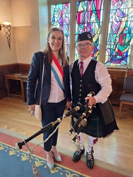 Mayor of Echternach Carole Hartmann with Gerrie Dunne, pipemaster of Killeshin Pipe Band, in Echternach Town Hall Mayor of Echternach Carole Hartmann with Gerrie Dunne, pipemaster of Killeshin Pipe Band, in Echternach Town Hall