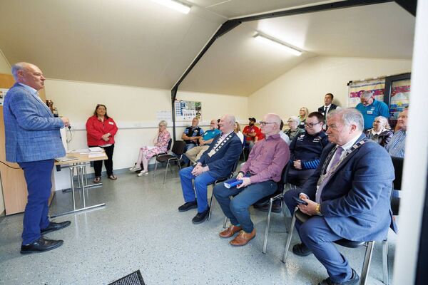 Pride of Place judge Liam Hannaway speaking during the visit to the Cáirdeas Centre Pride of Place judge Liam Hannaway speaking during the visit to the Cáirdeas Centre
