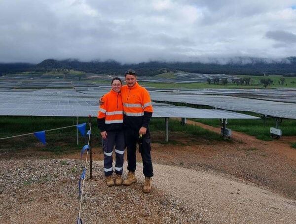 Ali Ruschitzko and Michael O'Grady working on a solar farm in Victoria