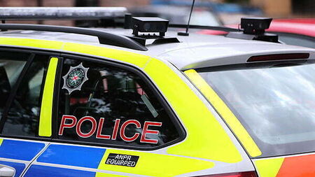 Man arrested after suspected stolen car damages taxi and police vehicles in Belfast