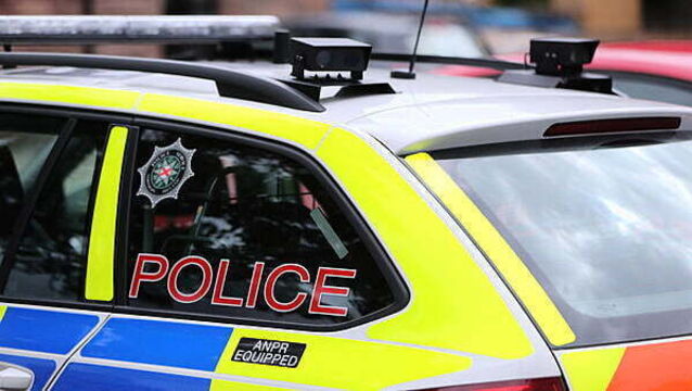 Man arrested after suspected stolen car damages taxi and police vehicles in Belfast