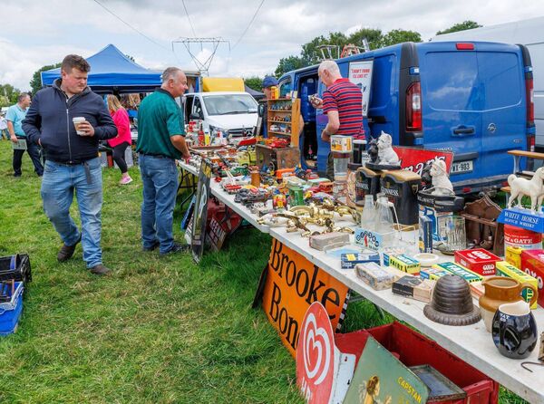 Viewing the antiques and collectibles at the rally Viewing the antiques and collectibles at the rally