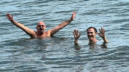 Oasis band members go swimming in Dublin