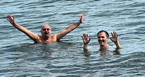 Oasis band members go swimming in Dublin
