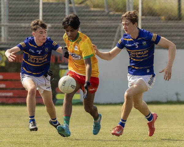 Carlow's Masfie Islam and Tipperary's Charlie McGonigle and David Ahearn. Carlow's Masfie Islam and Tipperary's Charlie McGonigle and David Ahearn.