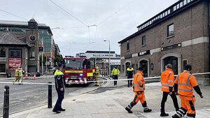Luas services to the Docklands paused ‘for period of time’ after blaze on bridge Luas services to the Docklands paused ‘for period of time’ after blaze on bridge