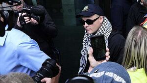 Kneecap rapper faces month-long wait over whether terror charge is thrown out