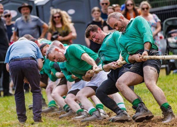 Showing the strain during the tug-of-war competition at the Tullow Show