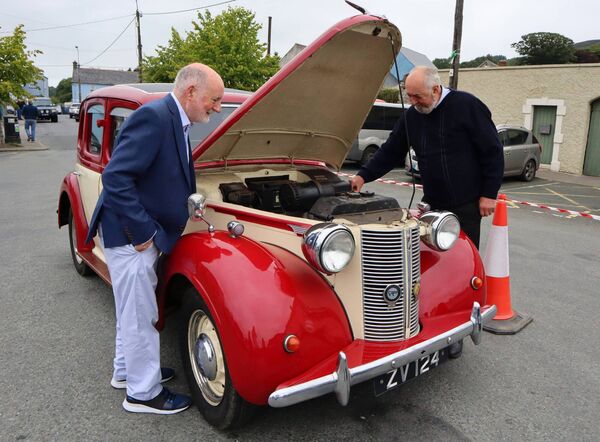 John Foley has a look under the hood of Joe Harney's Austin 16 John Foley has a look under the hood of Joe Harney's Austin 16