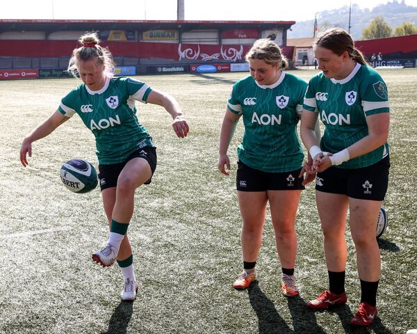 Sadhbh McGrath and Beth Buttimer admire some of Dannah O’Brien's fancy footwork Photo: ©INPHO/Ben Brady