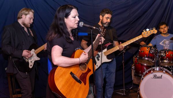 Lisa McAree performing at the Carlow Dad Rock jam session in Scraggs Alley, Carlow, also shown are Daniel Dunican, Daniel Craig and Egehan Ozfen Photos