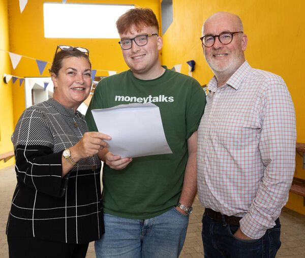 Patrick Kelly is shown with his parents Esther and Niall after picking up his Leaving Cert results in St Mary’s Knockbeg College Patrick Kelly is shown with his parents Esther and Niall after picking up his Leaving Cert results in St Mary’s Knockbeg College