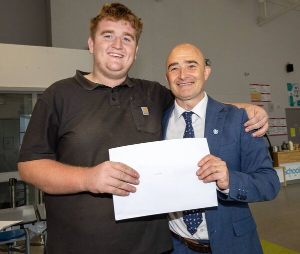 Edward Malone receives his Leaving Cert results from John Maye, principal St Mary’s Knockbeg College Edward Malone receives his Leaving Cert results from John Maye, principal St Mary’s Knockbeg College