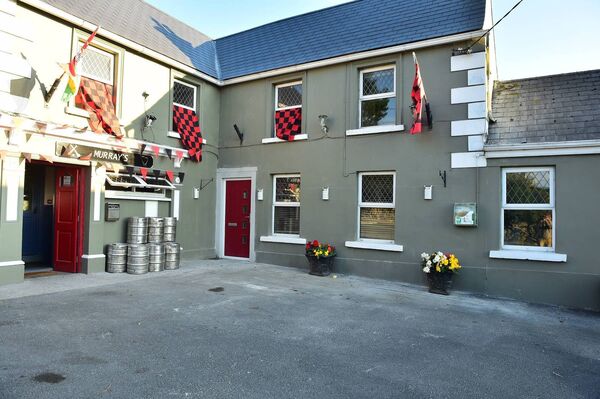 The flowers and pots are peplaced outside the pub Photo: Roger Jones The flowers and pots are peplaced outside the pub Photo: Roger Jones