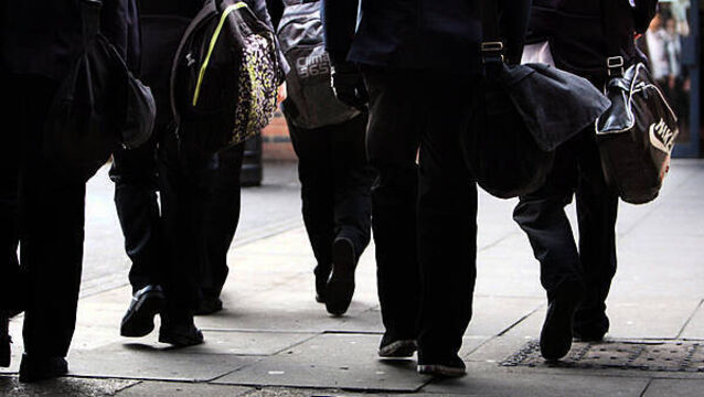 School secretaries and caretakers begin indefinite strike