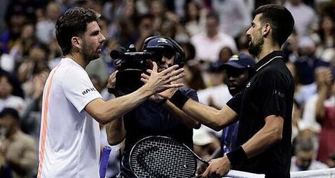 Novak Djokovic overcomes back issue to cruise past Cameron Norrie at US Open