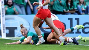 <p>Ireland's Dannah O’Brien scores Ireland's first try in the World Cup win over Spain today Photo: ©INPHO/Dan Sheridan</p>