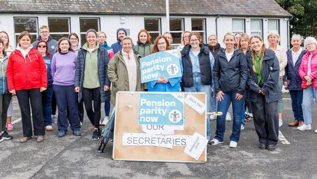 Staff, SNAs and bus escorts supporting school secretary Yvonne Abbey (centre) who was out on strike at Saplings Special School, Killeshin on Friday. Photo: Michael O'Rourke <p>Staff, SNAs and bus escorts supporting school secretary Yvonne Abbey (centre) who was out on strike at Saplings Special School, Killeshin on Friday. Photo: Michael O'Rourke</p>