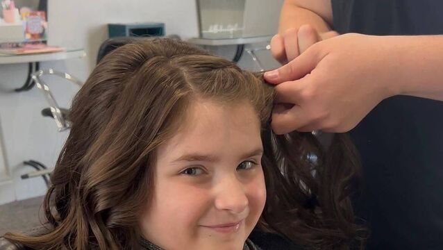 <p>Lily McCarthy will get her locks cut this week to raise money for three cancer support charities</p>