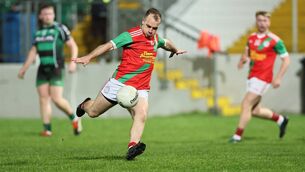 <p>Palatine's Jamie Kenny scores a fine goal against Bagenalstown Gaels</p>