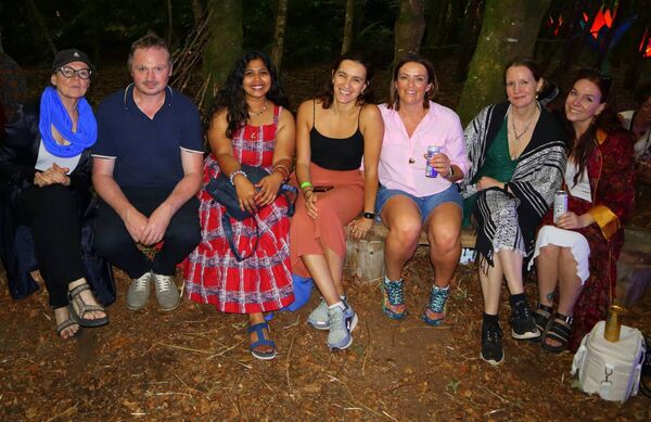 Some of the festival goers relaxing at Sharon Shannon's gig in the forest Some of the festival goers relaxing at Sharon Shannon's gig in the forest