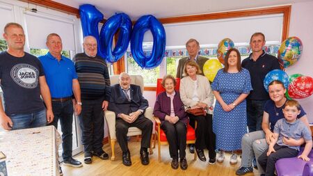 Family members travel from all over the country to help Liam Mullins celebrate his 100th birthday