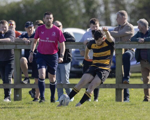 County Carlow's Ben Crotty kicking a conversion.