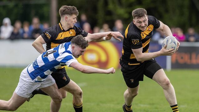 County Carlow's Jamie McCabe is tackled by Athy's David Downey during last season's Towns Cup final <p>County Carlow's Jamie McCabe is tackled by Athy's David Downey during last season's Towns Cup final</p>