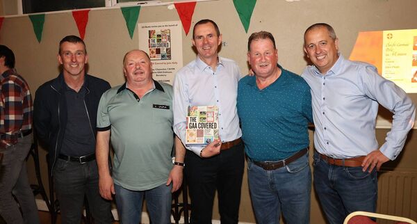 John Kelly at his book launch with referee Paud O'Dwyer and co - umpires Paul Treacy, Gerry O'Neill and Tommy Fitzharris