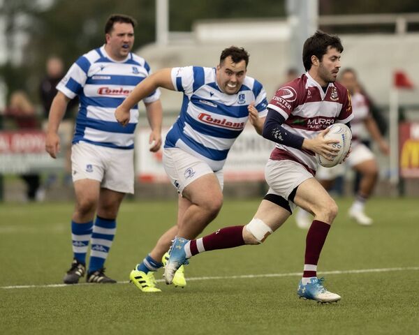 Tullow's Ryan O'Neill and Athy's Tadgh Foley. Tullow's Ryan O'Neill and Athy's Tadgh Foley.