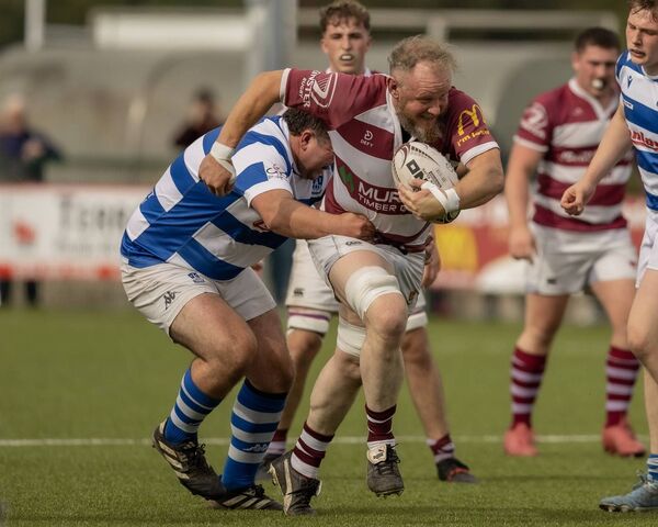 Tullow's Joe Waters and Athy's Tadgh Foley. Tullow's Joe Waters and Athy's Tadgh Foley.