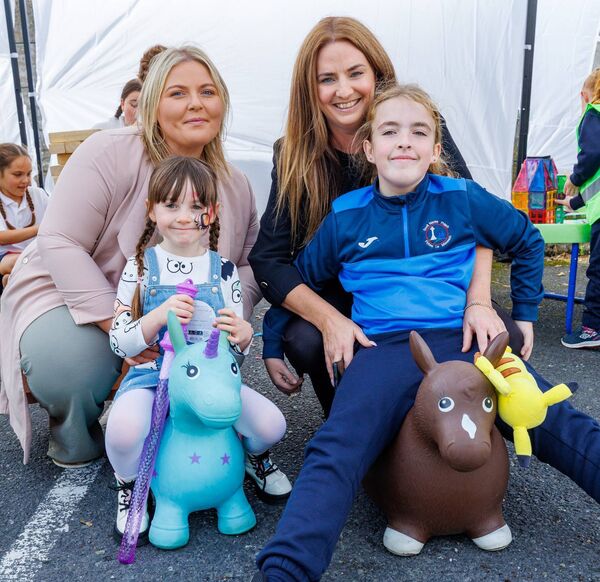Catherine McCarthy and Laura Kelly from Making Connections at St Catherine's with their daughters Kealy and Kate