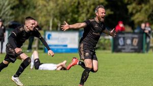 Extra-Time goal from Doyle sees Town into semis