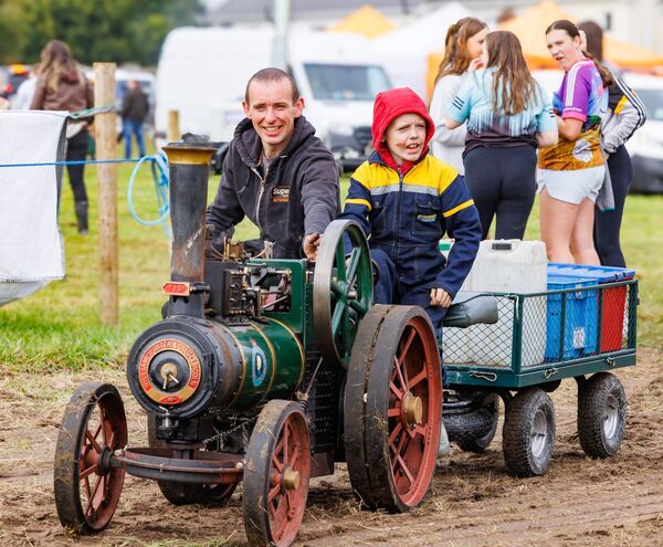 Trevor and Thomas Warner pictured on a Foster Steam Engine Trevor and Thomas Warner pictured on a Foster Steam Engine