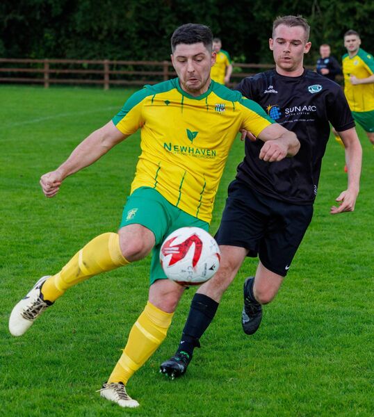 Crettyard’s Mark Lyons in control against New Oak’s Shane Barnes. Photo:© Michael O'Rourke Photography 2025