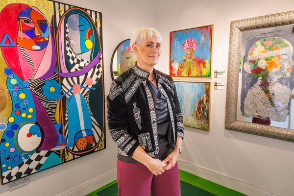 Ann-Marie Lawlor pictured with her exhibition titled 'Reflections' at the ArtBank gallery in Bunclody 