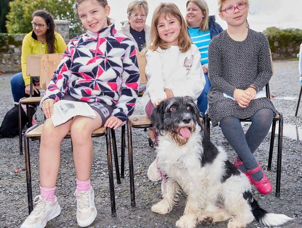 Lily Curtin, Daisy James (centre) and Cara Curtin with Daisy's dog Walter during the service for the blessing of the animals at St Mary's and Urglin Church of Ireland, Carlow Photos: Michael O'Rourke Photography