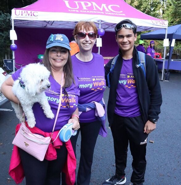 Linda Callinan, Marie and TJ Porter with Bailey the dog