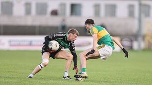 <p>Bagenalstown Gaels Robbie Kane is faced by Rathvilly's Paraic Deering. Photo: Pat Ahern</p>