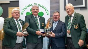 <p>Eamonn Tracey from Carlow, winner of the Conventional senior competition, is presented with the Esso Supreme trophy, NPA Trophy and gold medal by NPA chairman John Deery, Sean O'Brien, leas-cathaoirleach of Offaly County Council, and NPA president Mick Mahon at the Ploughing 2025 awards in Tullamore today (Sunday) Photo: Alf Harvey</p>