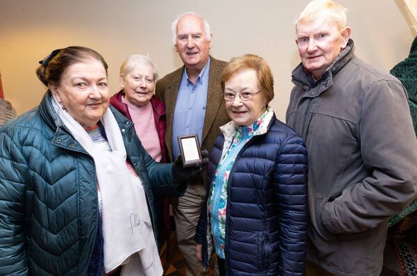 Mary Hogan holds a photograph of Rev Adam Bettisworth-Perry, the rector of Carlow in 1864, who performed the wedding ceremony of Ernest Shackleton's parents in St Mary's Church on 20 February 1872. Also pictured are Mary McDonnell, Paul Lyons and Robin and Nora James