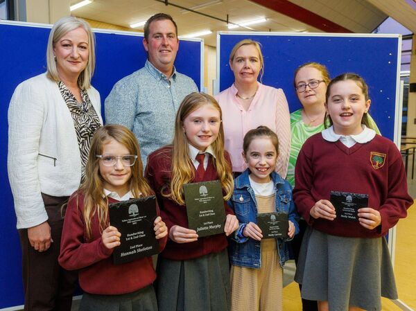 Winners in the Handwriting First and Second Class category: pictured are (1st) Juliette Murphy (Clonegal NS), (2nd) Hannah Skelton (Clonegal NS), (joint 3rd) Molly Curran (Rathvilly NS) and Molly Walsh (Clonegal NS), with Elaine Byrne and Deirdre Murphy of sponsor AIB Tullow and Robert Keogh, chairman of Tullow Show, and Nicola Brennan (Tullow Show Art Committee)