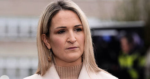 Connolly must publish emails querying vetting of former inmate, McEntee says