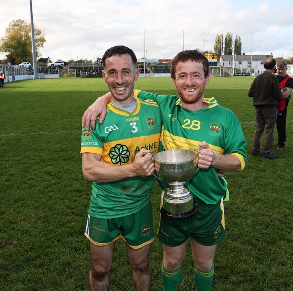 James and Alan Hickey celebrate with the cup after Fighting Cocks beat Leighlinbridge to win the JFC 'A' title. James and Alan Hickey celebrate with the cup after Fighting Cocks beat Leighlinbridge to win the JFC 'A' title.