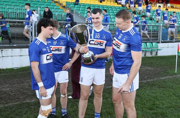 Old Leighlin players admire the Nationalist Cup Old Leighlin players admire the Nationalist Cup