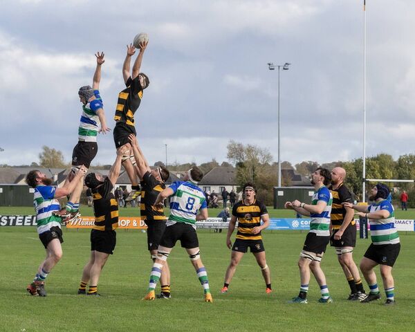 Carlow's John Murphy rises above Gorey's Ewan Stephens to win the line out. Carlow's John Murphy rises above Gorey's Ewan Stephens to win the line out.